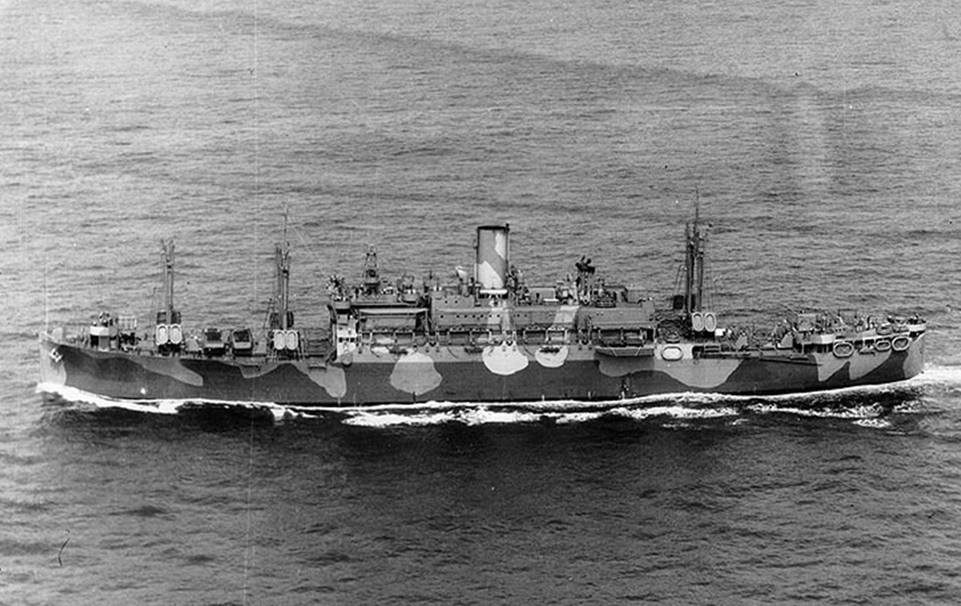 The Attack Transport USS Joseph T. Dickman in 1942 with its original camouflage paint scheme. The transport was repainted haze gray within a year and remained that way the rest of the war. (National Archives) The Attack Transport USS Joseph T. Dickman in 1942 with its original camouflage paint scheme. The transport was repainted haze gray within a year and remained that way the rest of the war. (National Archives)